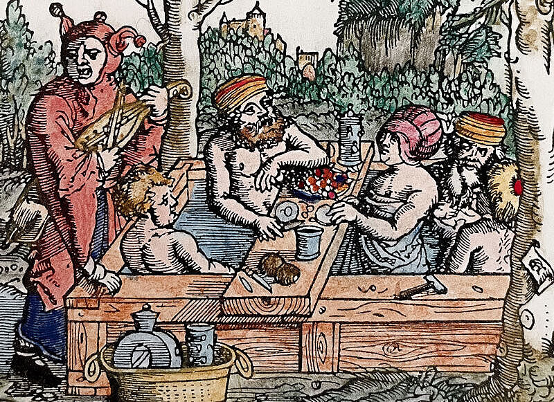 Zeichnung einer mittelalterlichen Badesituation von einem Badezuber in der Natur, in dem mehrere Menschen sitzen. Zeichnung einer mittelalterlichen Badesituation von einem Badezuber in der Natur, in dem mehrere Menschen sitzen.
